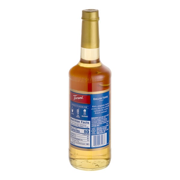 A Torani English Toffee flavoring syrup in a glass bottle with a blue label.