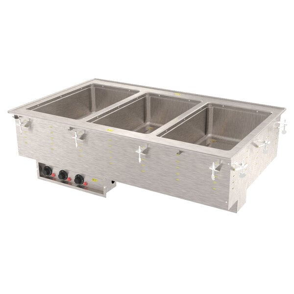 A stainless steel three compartment sink.