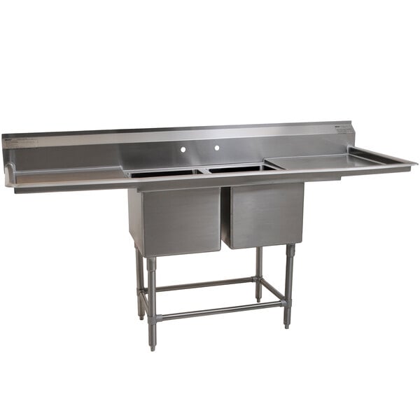 A stainless steel Eagle Group 2 compartment sink with two 24" drainboards.