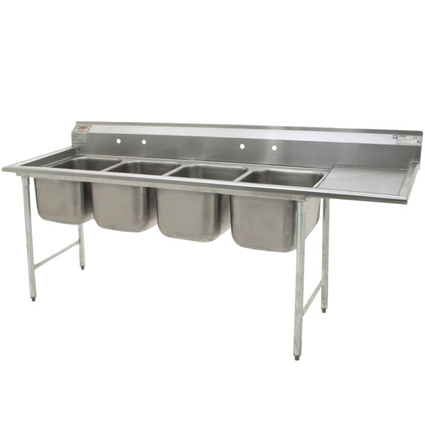 A Eagle stainless steel 4 compartment sink with 4 bowls and a right drainboard.