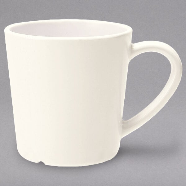 A close-up of a white GET Diamond Ivory mug with a handle.