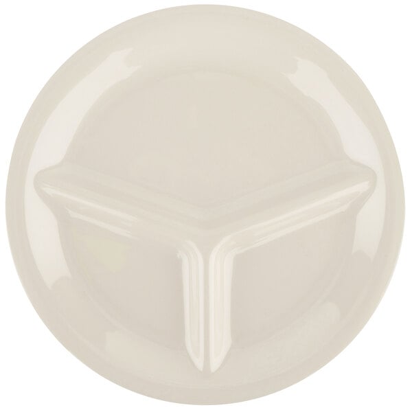 A white GET Diamond Ivory melamine plate with three compartments and a triangle pattern.