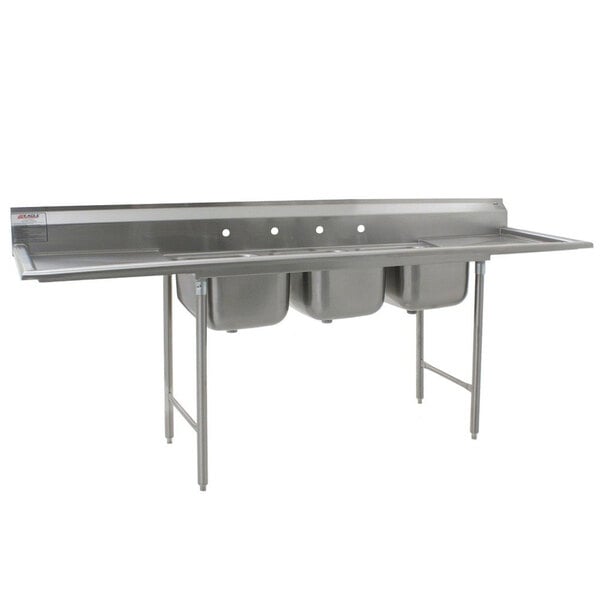 A stainless steel Eagle Group 3 compartment sink with two drainboards.