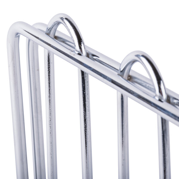 A close-up of a Metro chrome wire shelf divider on a metal rack.