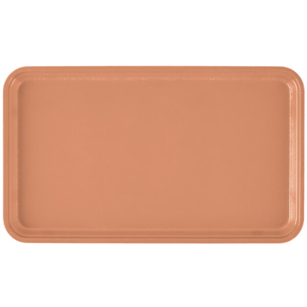 A rectangular dark peach Cambro tray on a counter.