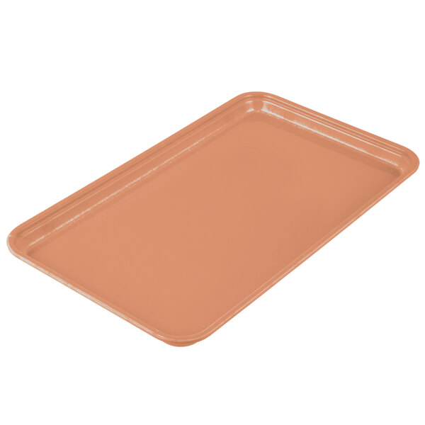 A dark peach rectangular fiberglass Cambro tray.