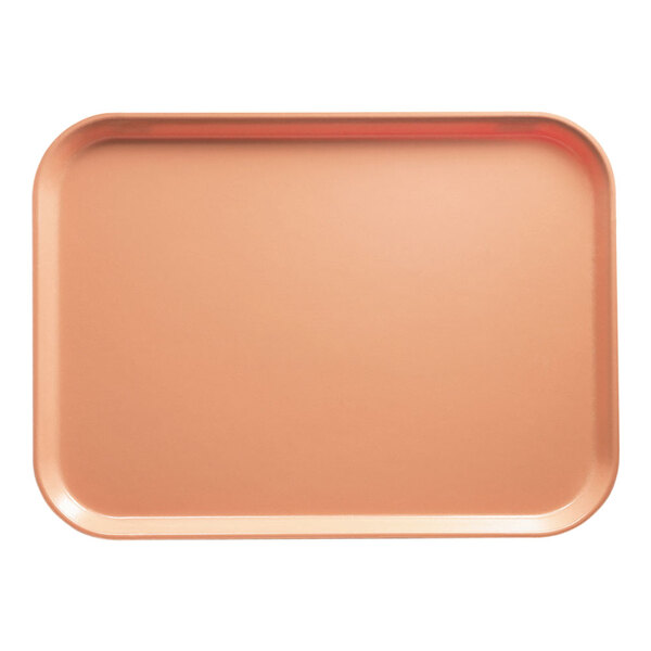 A rectangular Cambro tray with a dark peach surface.