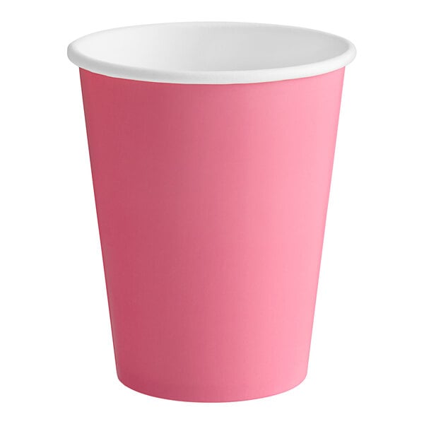 A pink paper cup with a white rim.