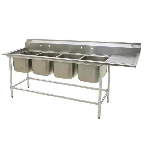 A stainless steel Eagle Group 4 compartment sink with 18" drainboard.