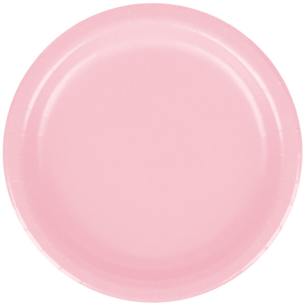 A close-up of a pink Creative Converting paper plate.