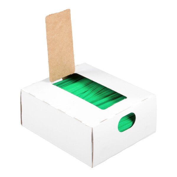 A white box with a rectangular opening on top, revealing a stack of green twist ties inside.