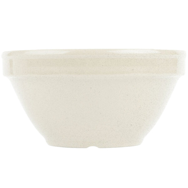 A close-up of a GET Santa Fe Ironstone bowl with a white surface.