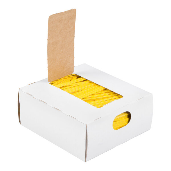 A white cardboard box with a partially open top, revealing a stack of yellow twist ties inside.
