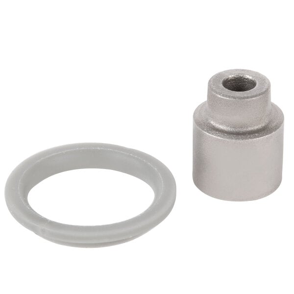 A close-up of a metal ring with a metal nut and blade.