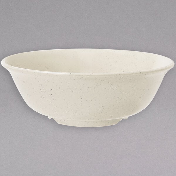 A white bowl with a speckled rim.