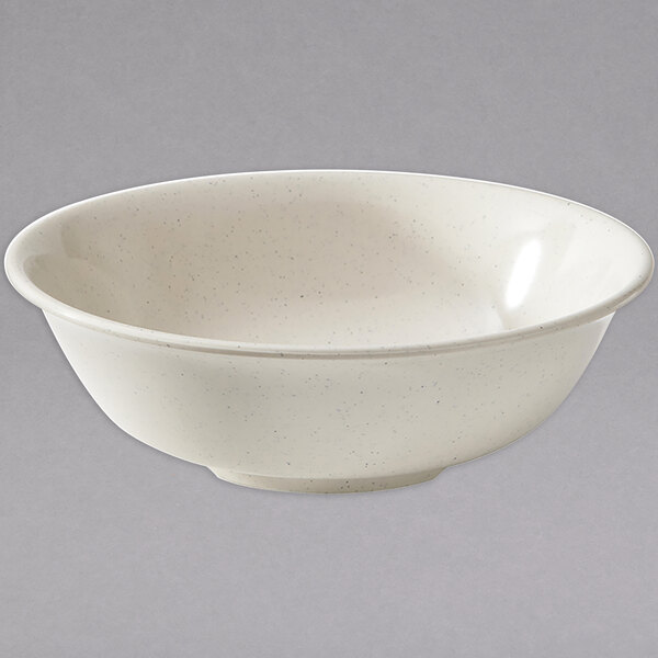 A white melamine bowl with a speckled rim.