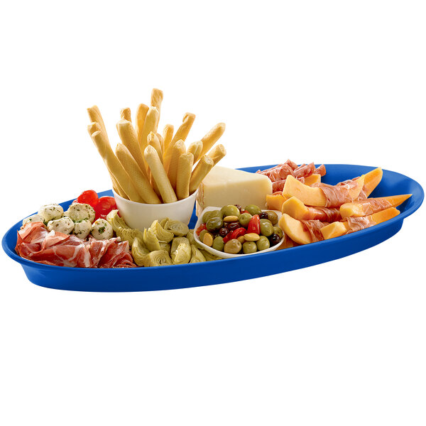 A Tablecraft cobalt blue cast aluminum platter with food on it.