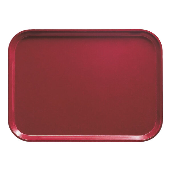 A red Cambro rectangular tray on a counter.