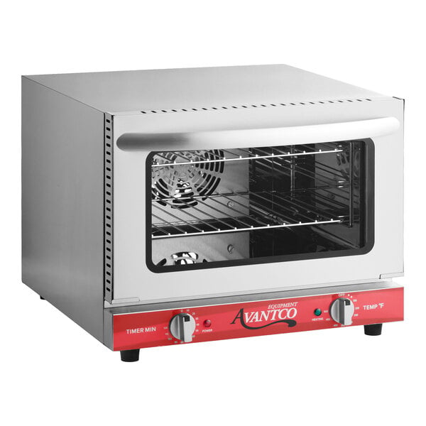 A stainless steel countertop convection oven with a glass door, two control knobs, and interior wire racks.