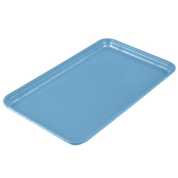 A rectangular robin egg blue Cambro tray on a counter.