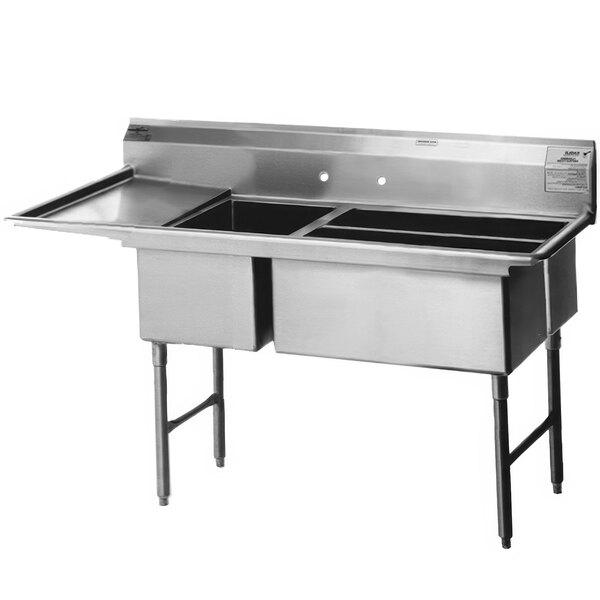 A stainless steel Eagle Group 3 compartment sink with 18" left drainboard.