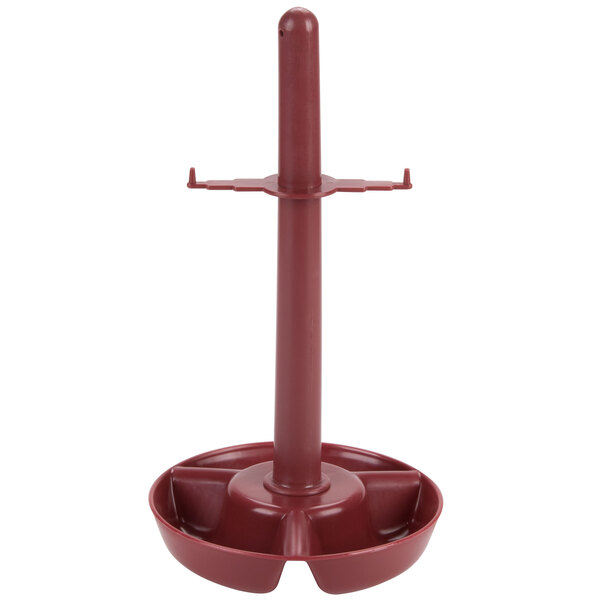 A red plastic pole with a white handle.