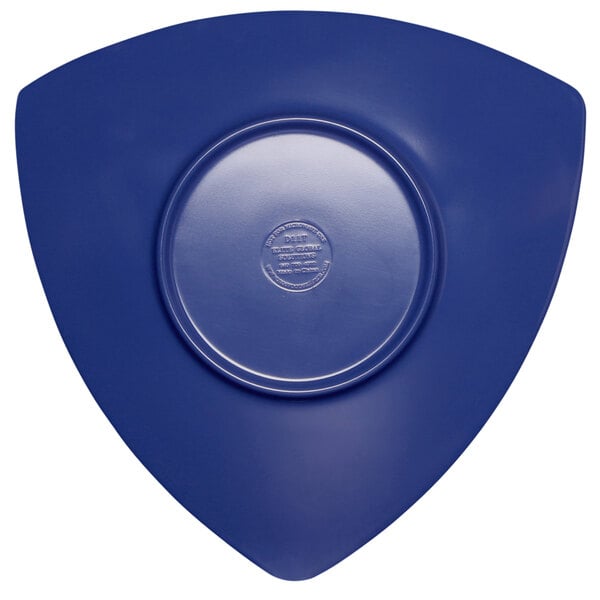 A blue triangle shaped plate with a circular design.