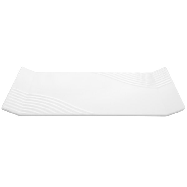 A white rectangular melamine tray with wavy lines.