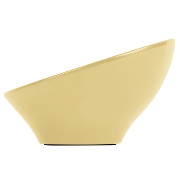 An Elite Global Solutions banana crepe melamine bowl with a slanted edge.