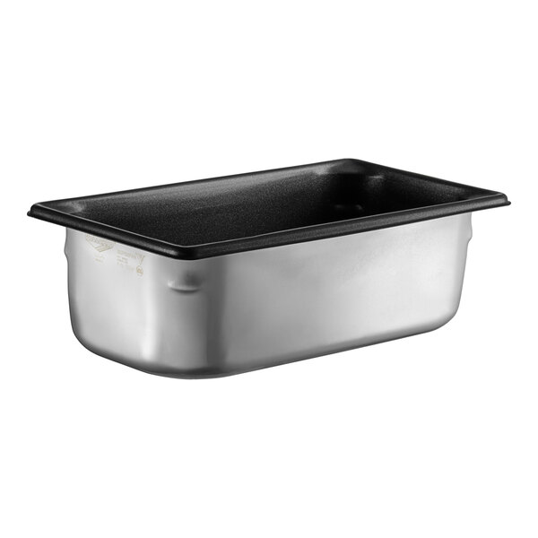 A stainless steel Vollrath Super Pan V with SteelCoat non-stick coating.