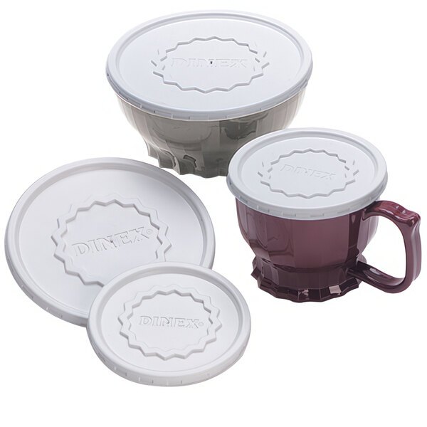 A group of white plastic lids.