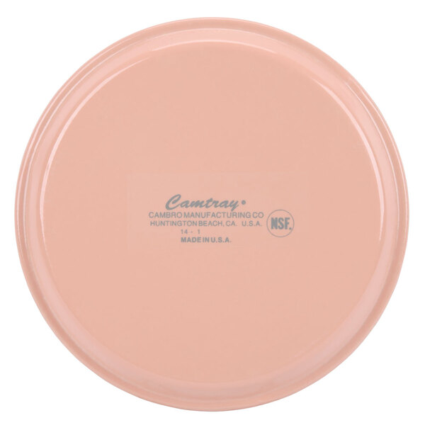 A dark peach round plastic tray with the word "Camtray" in blue.