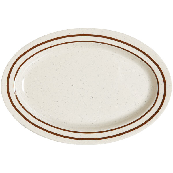 A white oval plate with brown lines.