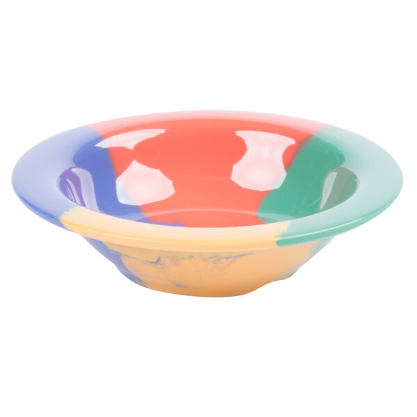 A colorful bowl with a multicolored diamond design on a white background.