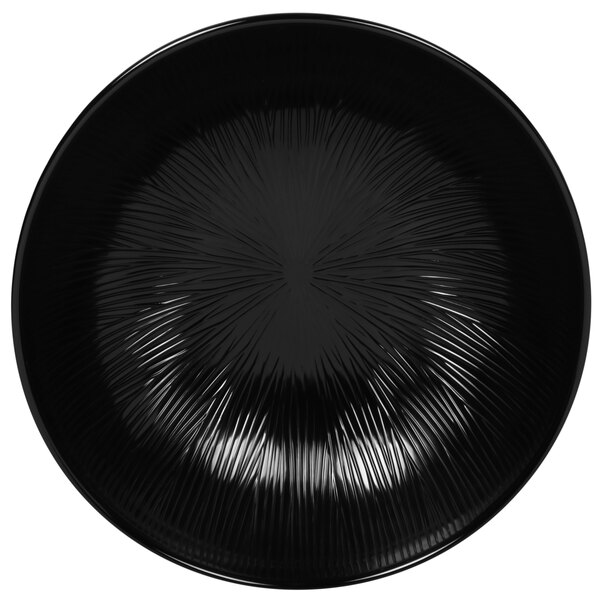 A black melamine bowl with a circular design.