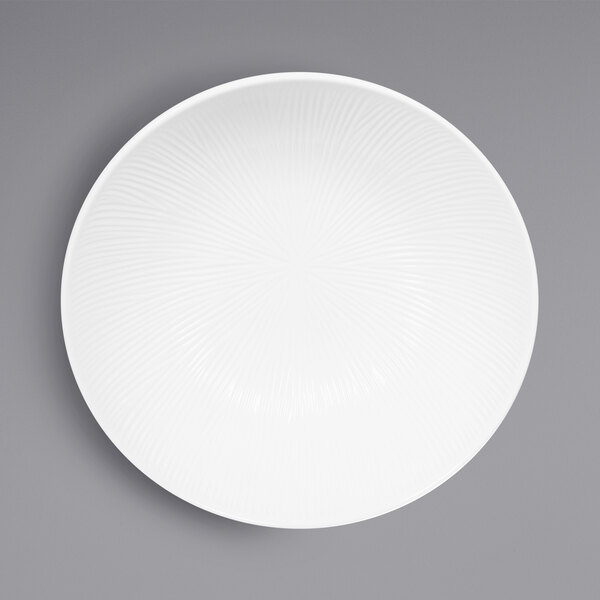 A white melamine bowl with a spiral pattern on the inside.