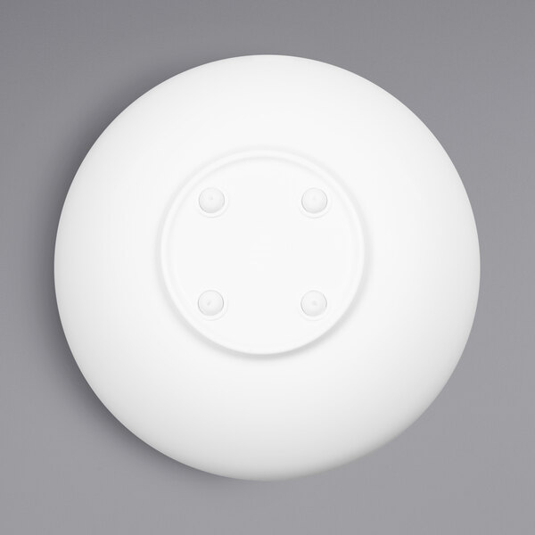 A white melamine bowl with a sunburst pattern.