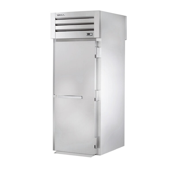 A white True roll-through heated holding cabinet with a stainless steel door and silver handle.