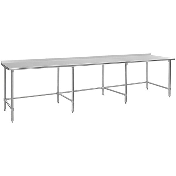 A long rectangular stainless steel Eagle Group work table with metal legs.