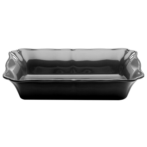 A black rectangular melamine dish with a ruffled edge.