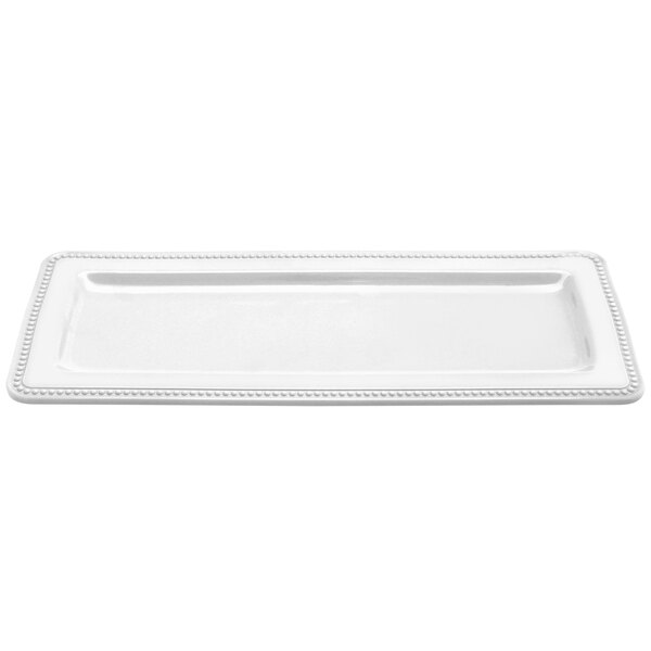 A white rectangular Elite Global Solutions melamine tray with a beaded border.