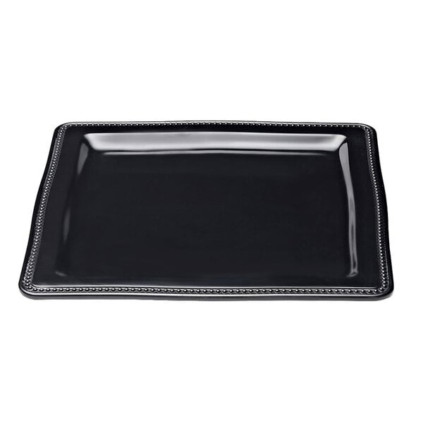 A black square melamine plate with a silver beaded border.