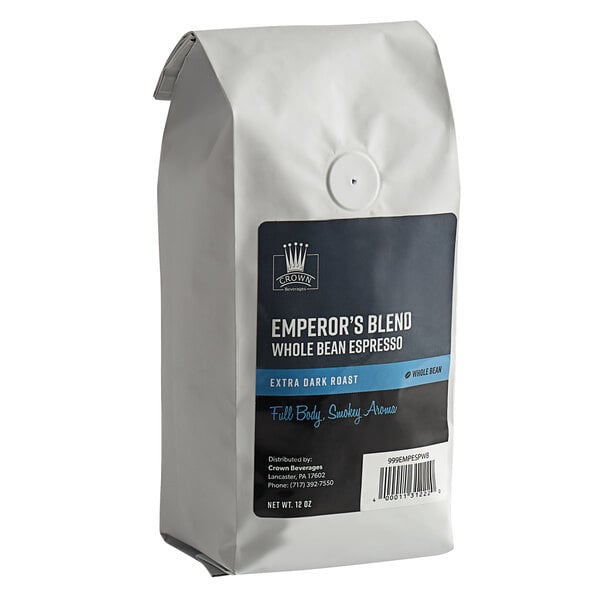 A white bag of Crown Beverages Emperor's Blend whole bean espresso with a label.