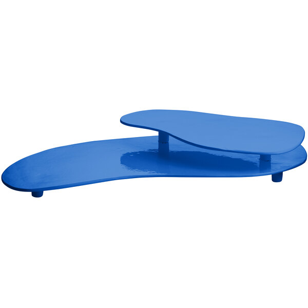 A cobalt blue cast aluminum two tiered platter with a curved top.
