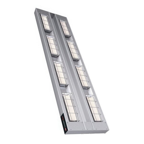 A long rectangular metal food warmer with many small lights on it.