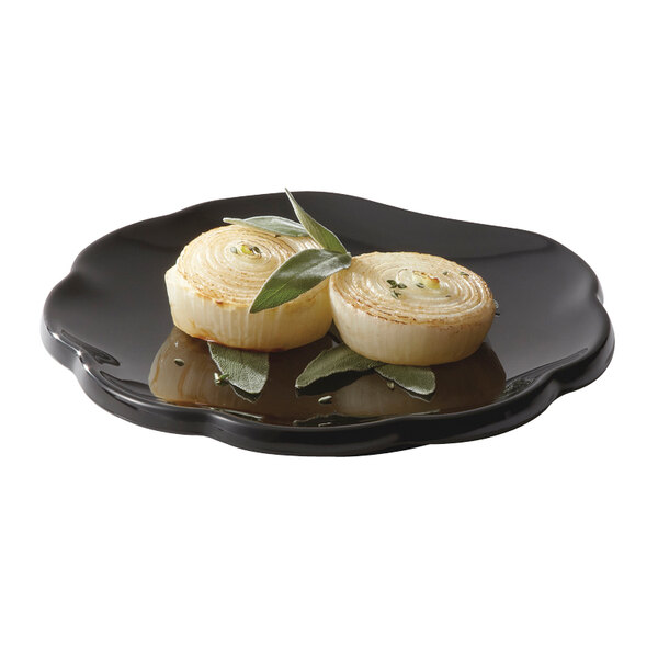 onions on a plate with leaves