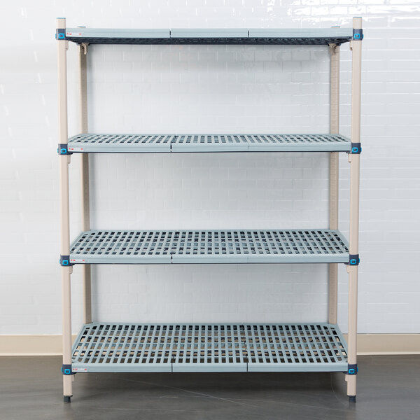 A white metal MetroMax Q shelf with a white metal grate with holes.