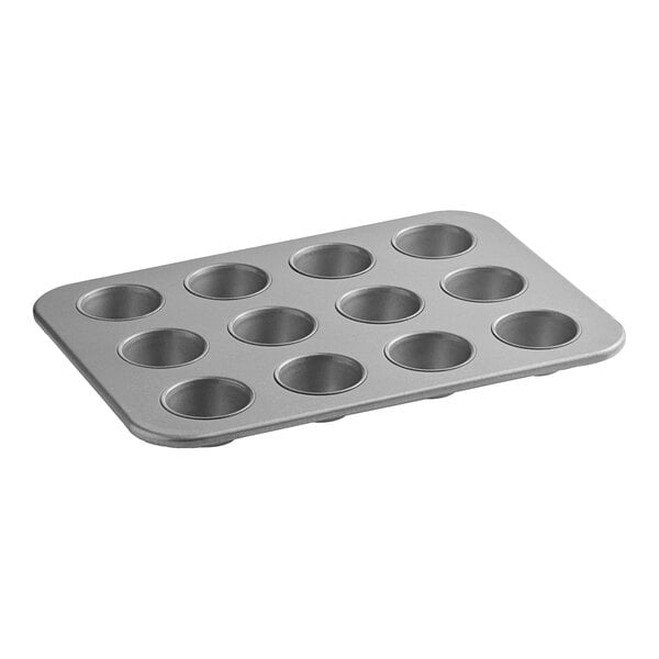 A 12-cup aluminized steel muffin or cupcake pan with a glazed finish.