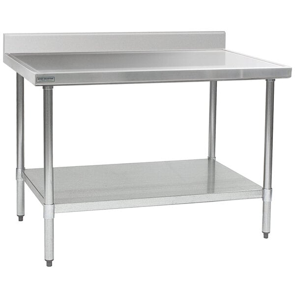 A stainless steel table with a shelf.