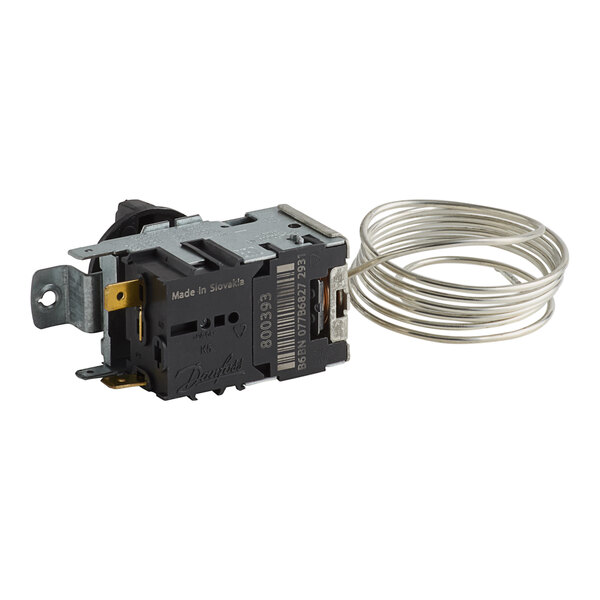 A black and silver True Temperature Controller with a wire attached.